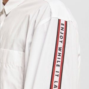 [MAN] shirt with striped and text